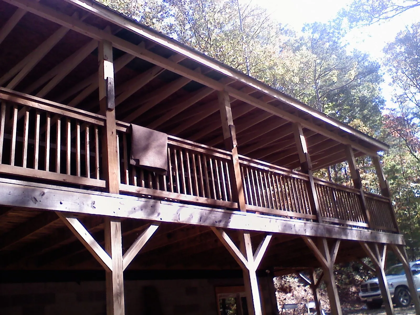 Timber framing under a new elevated porch and deck — Roof Leak Repair in Freedom by Roofing Brothers